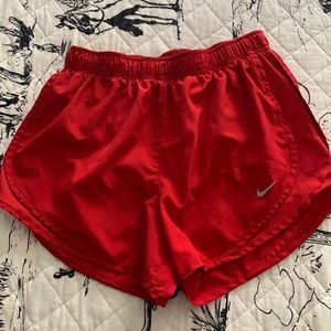 Medium red Nike running shorts